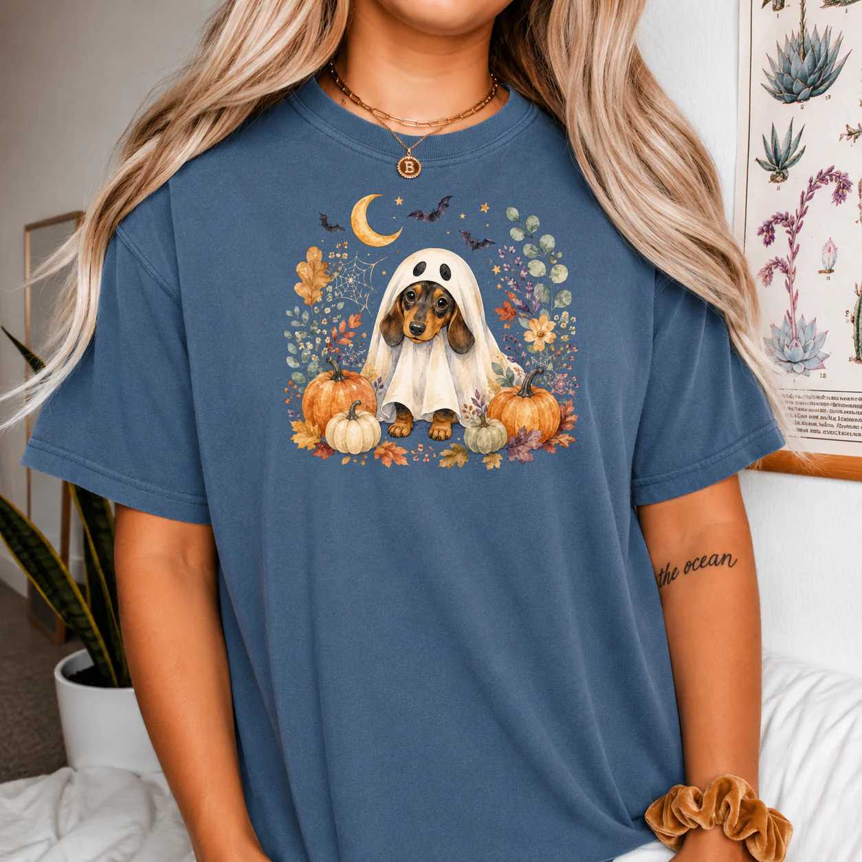 Halloween Dachshund Ghost T-Shirt for Dog Lovers featuring a Spooky Pumpkin and Autumn Leaves Design